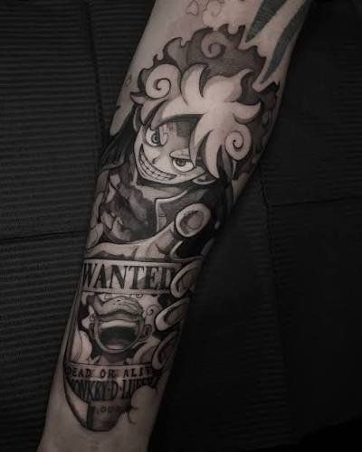 Tatuaje de anime realizado en Black and Grey.