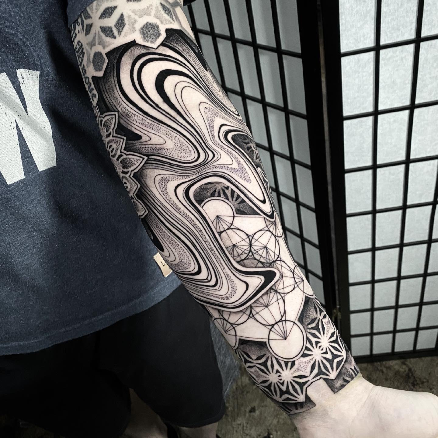 Tatuaje de geometría sagrada.